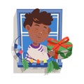 Freckled Boy in the Window Holding Wrapped Gift Box with Ribbon Bow Vector Illustration