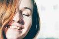 Freckled brunette young woman smiling Royalty Free Stock Photo