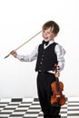 Freckled red-hair boy playing violin. Royalty Free Stock Photo