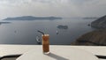 Freddo Espresso on transparent glass in Santorini, Greece. Royalty Free Stock Photo