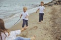 Fredericia, Denmark, September 2022: mother play with sons in Denmark