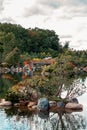 Frederik Meijer Gardens - Grand Rapids, MI, USA - September 8th 2019:  Small island in the middle of a lake of the japanese garden Royalty Free Stock Photo