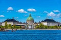 Frederik\'s Church known as The Marble Church and Amalienborg palace with the statue of King Frederick V in Copenhagen, Denmark Royalty Free Stock Photo