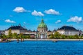 Frederik\'s Church known as The Marble Church and Amalienborg palace with the statue of King Frederick V in Copenhagen, Denmark Royalty Free Stock Photo