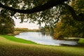 Frederiksborg Castle Park in autumn with mighty deciduous, landscaped lake Royalty Free Stock Photo