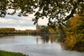 Frederiksborg Castle Park in autumn with mighty deciduous, landscaped lake Royalty Free Stock Photo