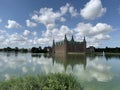 Frederiksborg castle with reflections in the water Royalty Free Stock Photo