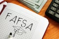 Free Appication for Federal Student Aid FAFSA is shown on the photo using the text