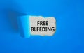 Free bleeding symbol. Concept words Free bleeding on beautiful white paper. Beautiful blue table blue background. Gen Z,