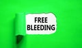 Free bleeding symbol. Concept words Free bleeding on beautiful white paper. Beautiful green table green background. Gen Z,