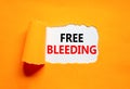 Free bleeding symbol. Concept words Free bleeding on beautiful white paper. Beautiful orange table orange background. Gen Z,
