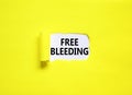 Free bleeding symbol. Concept words Free bleeding on beautiful white paper. Beautiful yellow paper background. Gen Z, motivational