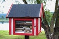 Free book sharing mini house near the river.