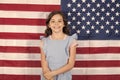 Free born and free bred. Carefree small child enjoying happy childhood. Happy little girl smiling on american flag decor