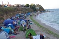 Tents pitched along the beach in Vama Veche