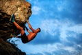 Free climber holding on the cliff Royalty Free Stock Photo