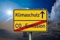 Traffic sign with the german words for climate protection and co2 emission Royalty Free Stock Photo