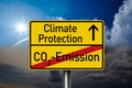 Traffic sign with the words climate protection and co2 emission Royalty Free Stock Photo