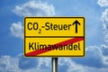 Traffic sign with the german words for CO2 Tax and climate change