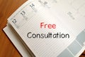 Free consultation write on notebook Royalty Free Stock Photo