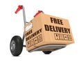 Free Delivery - Cardboard Box on Hand Truck. Royalty Free Stock Photo