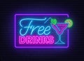 Free drinks neon sign on brick wall background.