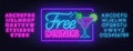 Free drinks neon sign on brick wall background. Royalty Free Stock Photo