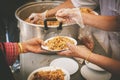 A free food kitchen that feeds hundreds of hungry poor people : problem concepts of disadvantaged people and hunger