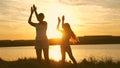 Free girls dance on the beach. Party by the lake, the children are dancing. beautiful healthy girls enjoy listening to Royalty Free Stock Photo