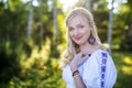 Free Happy smiling Woman Enjoying Nature. Beauty Girl Outdoor  sunset in forest. Freedom concept. Beauty Girl in birch trees in su Royalty Free Stock Photo