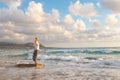 Free Happy Woman Enjoying Sunset on Sandy Beach