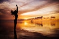 Free happy woman raising arms watching the sun Royalty Free Stock Photo
