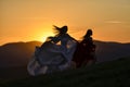 Free happy womans enjoying nature sunset. Freedom, happiness and enjoyment concept