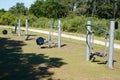 Free outdoor gym grey exercise stations in public park with outdoors gym equipment in park fitness area sports ground