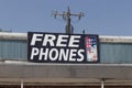 FREE PHONES advertisement with an iPhone. Free or reduced cost phones are an enticement to change providers