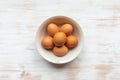 Free-range organic brown eggs in bowl on wood background with copy space Royalty Free Stock Photo