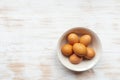 Free-range organic brown eggs in bowl on wooden background, copy space Royalty Free Stock Photo