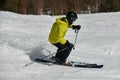 Free rider seen from behind making a turn in Stowe Mountain resort in Vermont