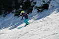 Free rider seen from side angle making a turn in Stowe Mountain resort in Vermont