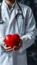 Cardiologist doctor holding a heart Royalty Free Stock Photo