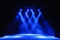 Free stage with lights, background of empty stage, spotlight, neon light, smoke. Royalty Free Stock Photo