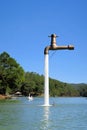 Free standing faucet floating over a lake