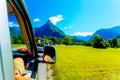 Free summer car travelling road trip in beautiful mountain landscape Royalty Free Stock Photo