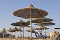 Free sunbeds and umbrellas on the beach