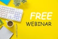 FREE WEBINAR. Flat lay composition with computer keyboard and stationery on yellow background, flat lay Royalty Free Stock Photo