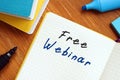 Free Webinar sign on the piece of paper Royalty Free Stock Photo
