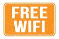 FREE WIFI, words on orange rectangle stamp sign Royalty Free Stock Photo