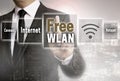 Free wlan businessman with city background concept