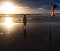 Free woman enjoying freedom feeling happy at beach at sunset. Beautiful serene relaxing woman in pure happiness and Royalty Free Stock Photo