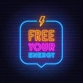 Free Your Energy neon sign on brick wall background.